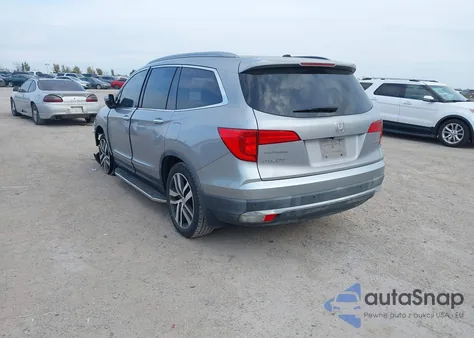 2017 Honda Pilot Touring z USA, uszkodzony, nr VIN 5FNYF5H98HB045265